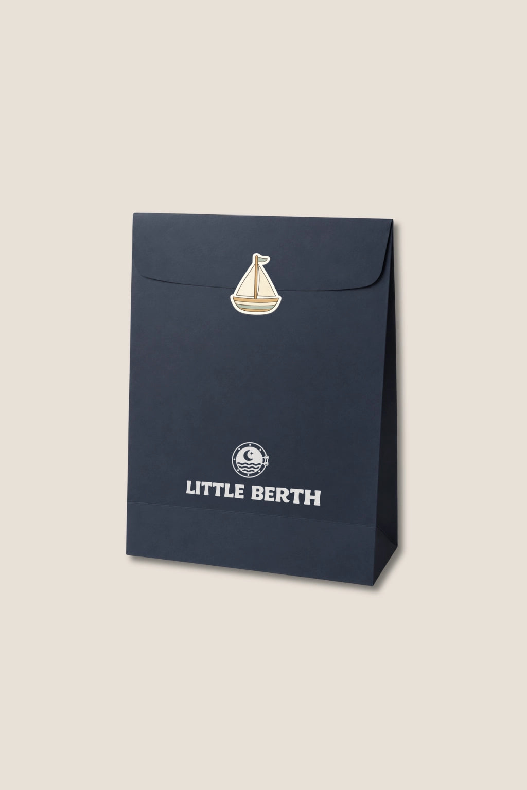 Navy blue packaging with 'Little Berth' branding on a beige background.