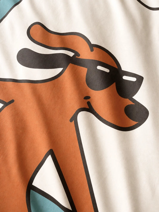 Close-up of an organic cotton duvet cover featuring an illustrated cartoon dog with black shades.